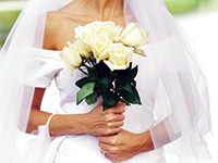Bride with a white bouquet