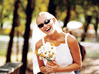 Happy bride with sunglasses