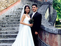 Couple infront of stone steps